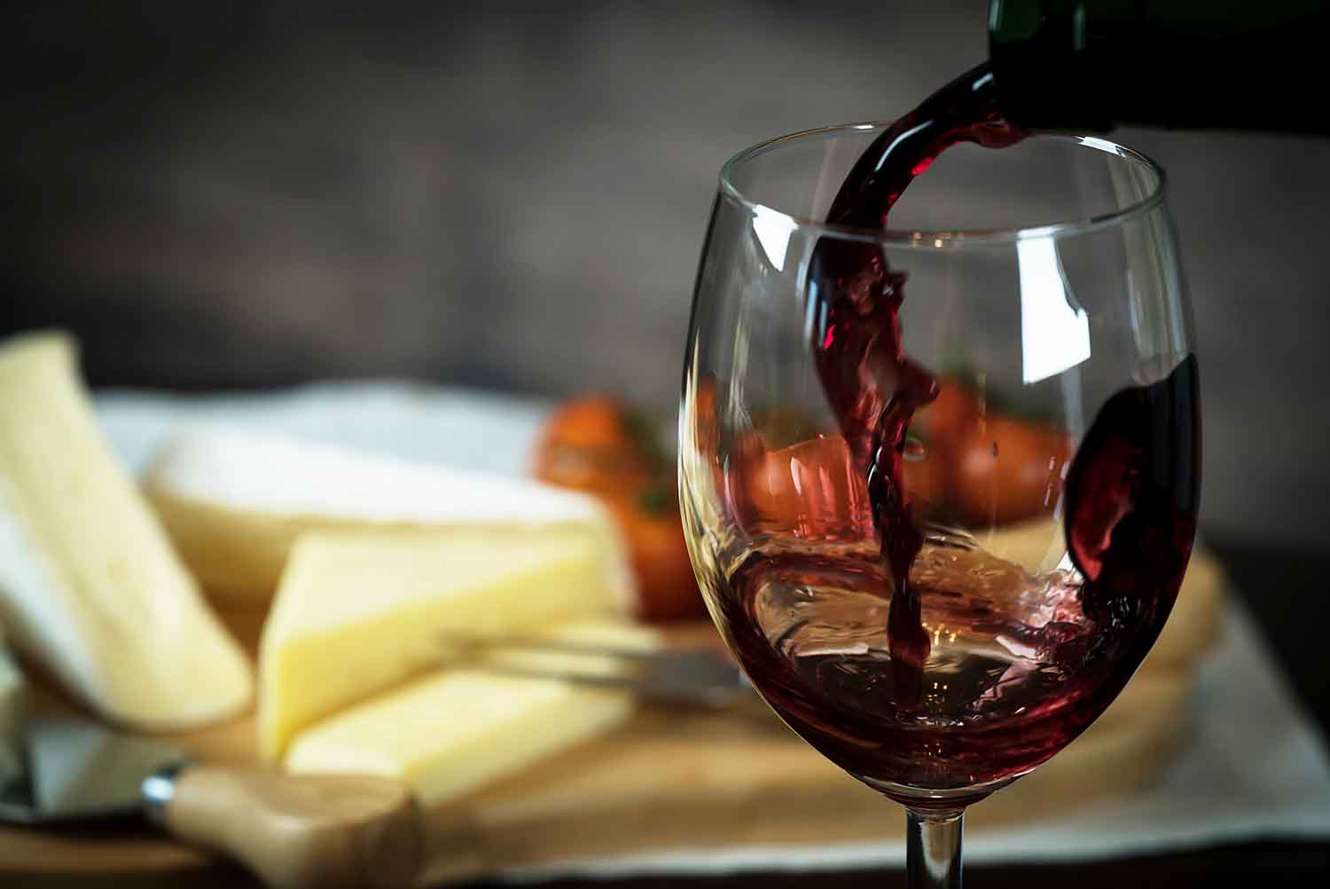 Red wine and cheese at a wine bar