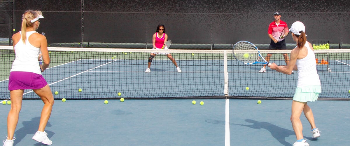 Group playing tennis