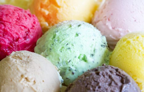 Close up of various ice cream flavors.
