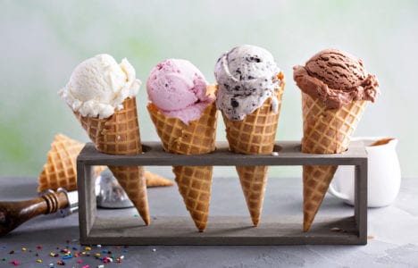 Four waffle ice cream cones.