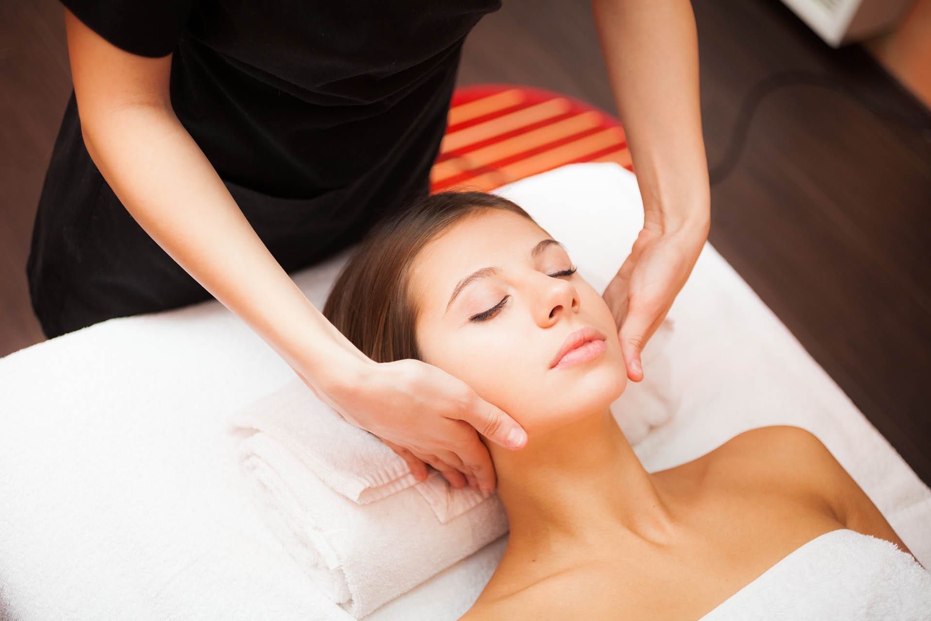 Woman getting a facial massage